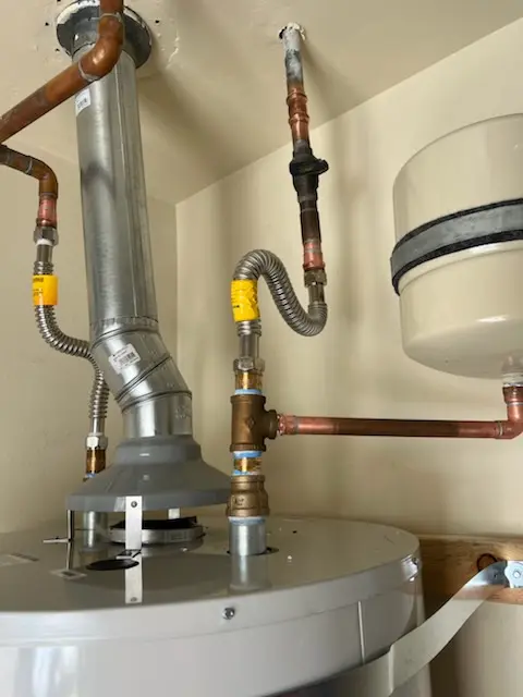 Water heater installation and plumbing repair in University Square